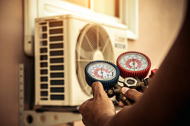 Professional Heat Pump Repair technician working in Croydon, UT
